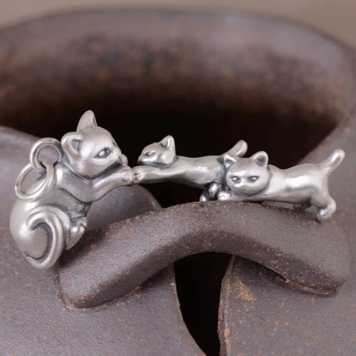 Pendentif maman et ses chatons en argent