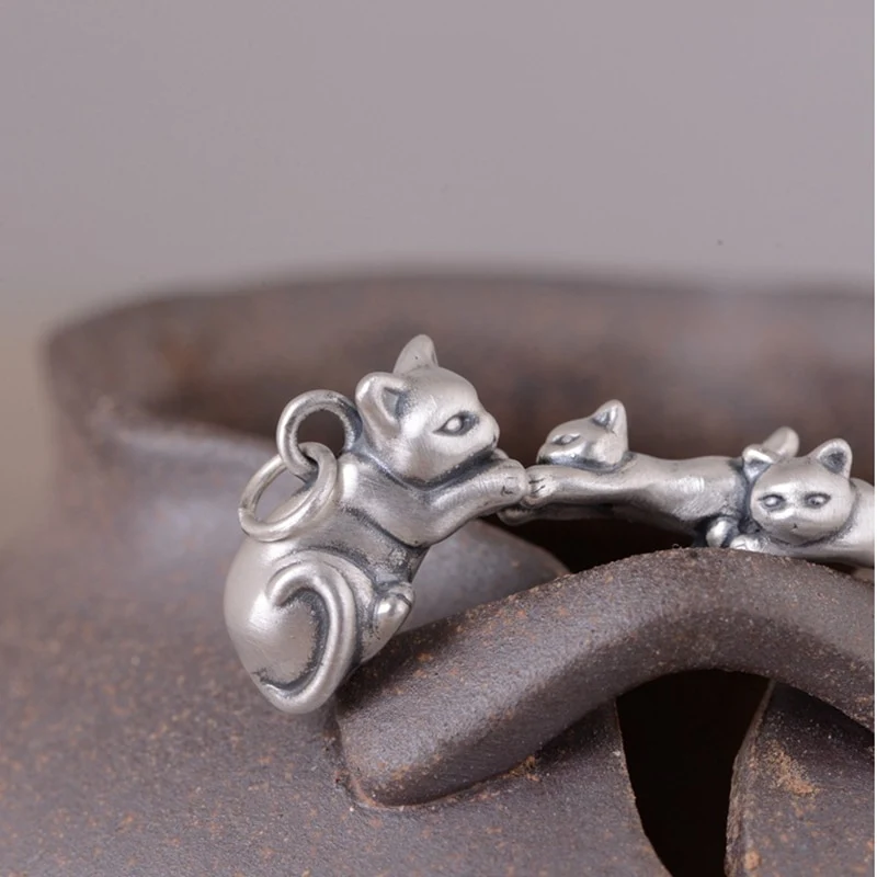 Pendentif maman et ses chatons en argent
