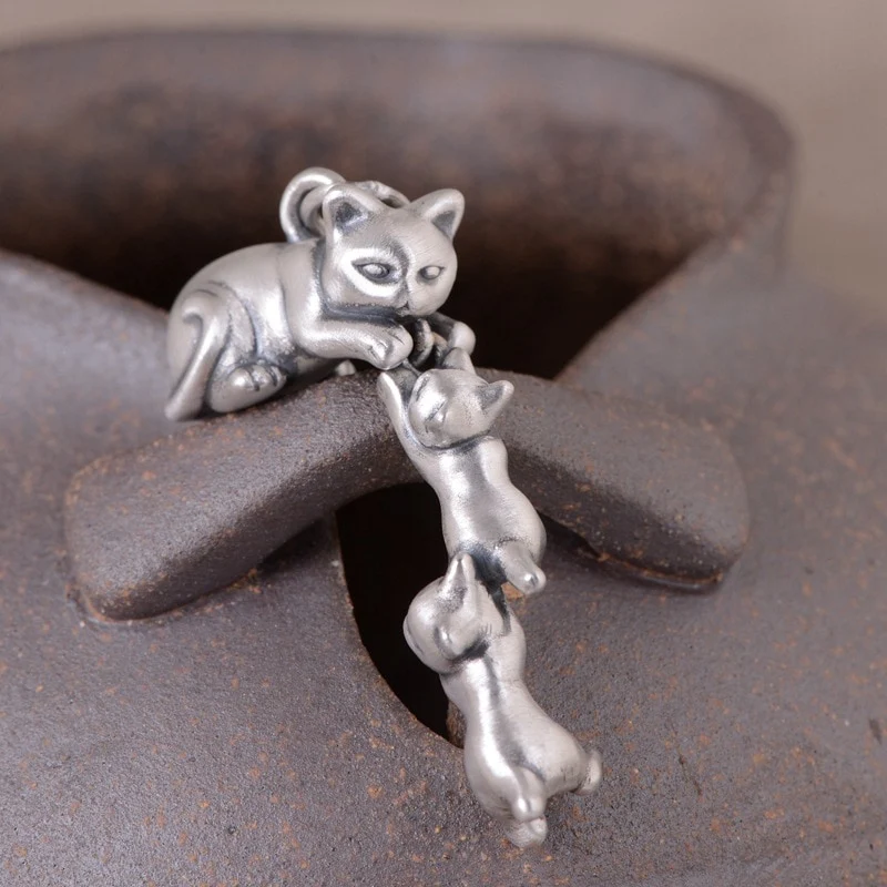 Pendentif maman et ses chatons en argent