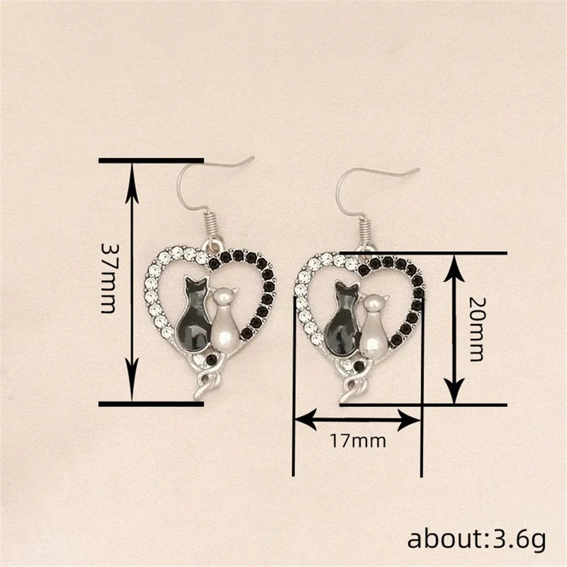 Boucles Chat Élégantes Zircon