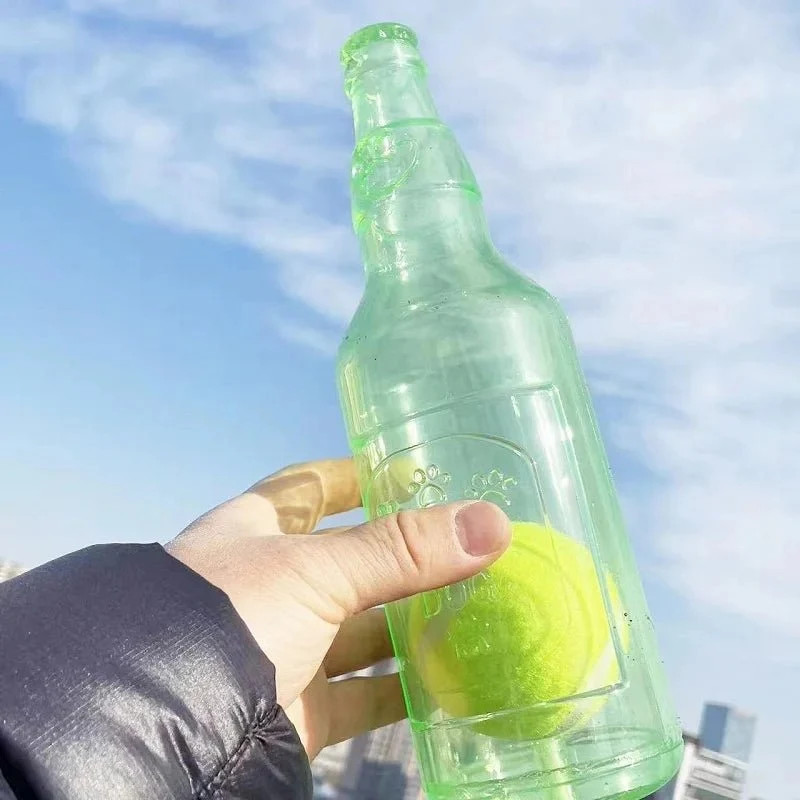 Bouteille avec balle pour chien