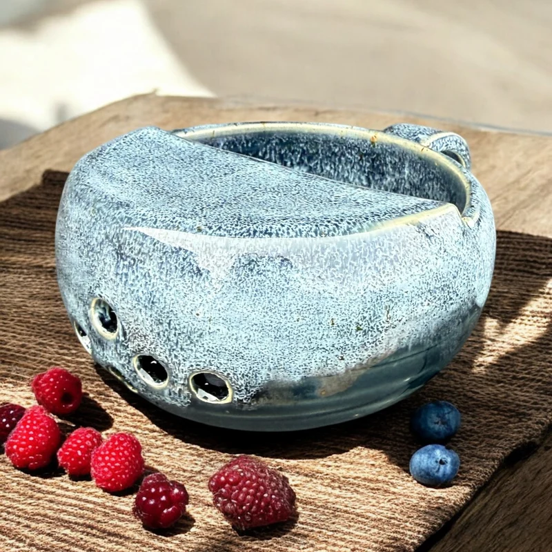 Handmade ceramic berry rinsing mug