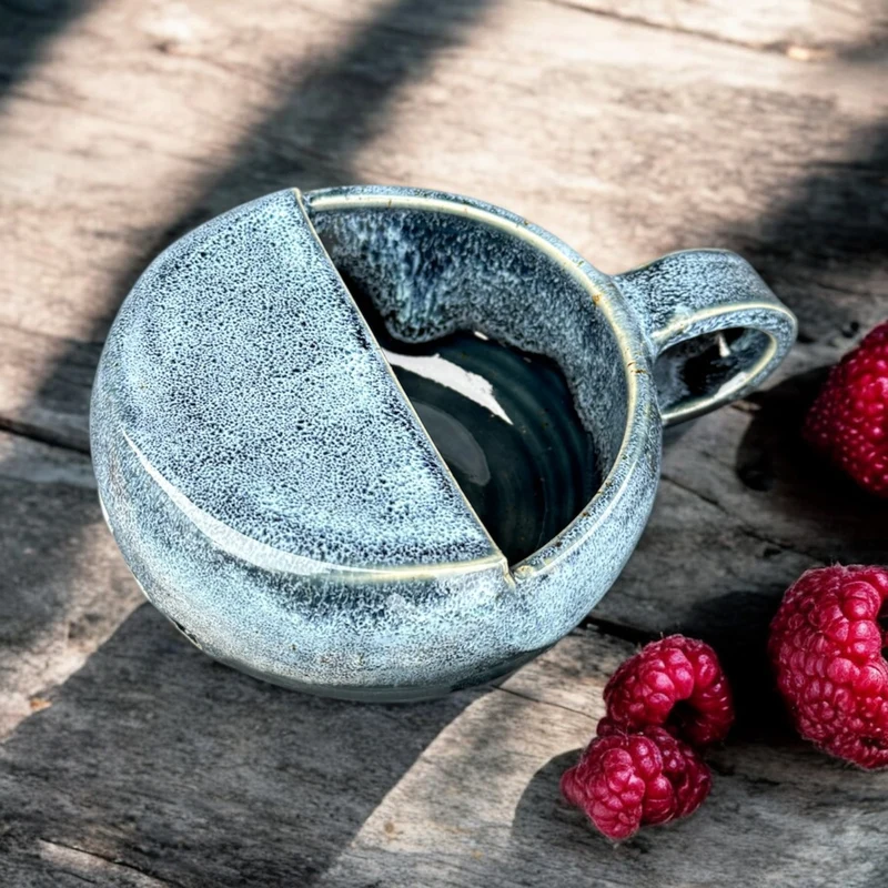 Handmade ceramic berry rinsing mug