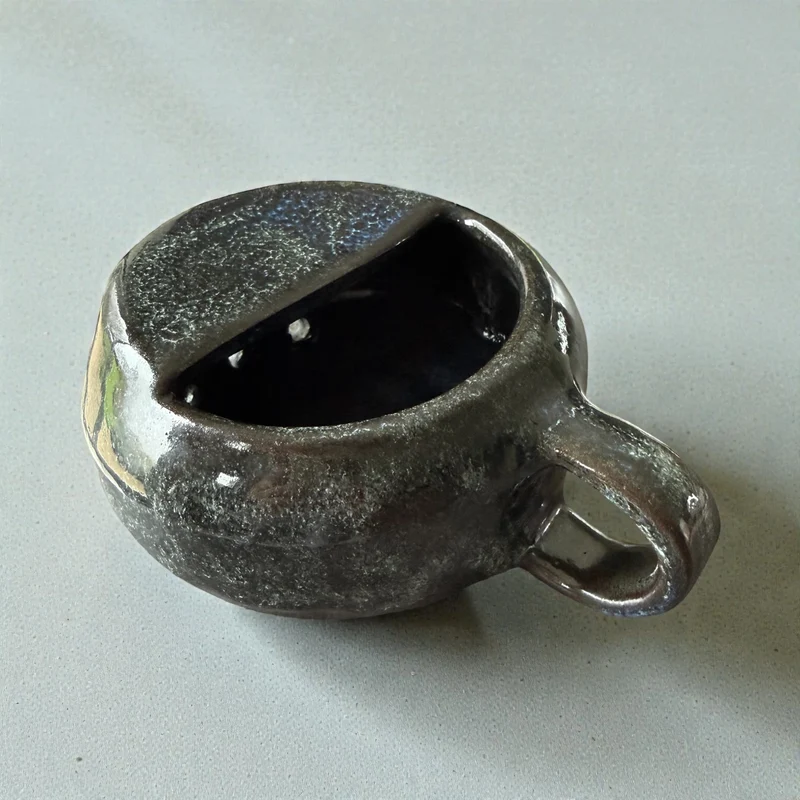 Handmade ceramic berry rinsing mug