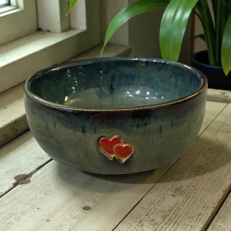 Handmade ceramic bowl with hearts