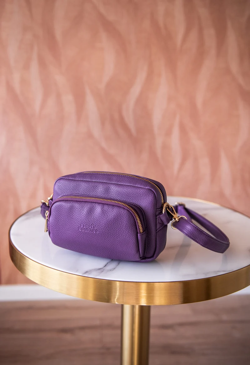 Sac banane avec distributeur de sacs canins intégré